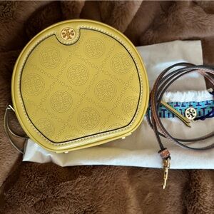 Tory Burch round yellow bag.